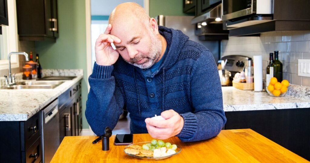 A Man With Diabetes Checking His Sugar Level